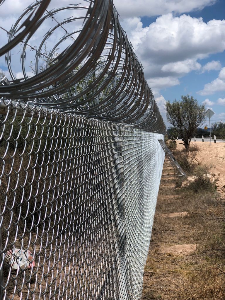 Instalación de concertina en muro