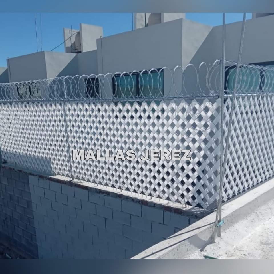 Instalación de concertina en muro