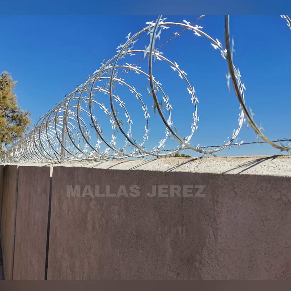 Instalación de concertina en muro
